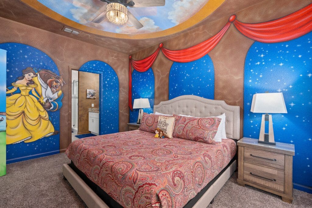 One of the rooms in vacation rentals near Disney World with pools features a Beauty & the Beast-themed king bedroom on the main floor.
