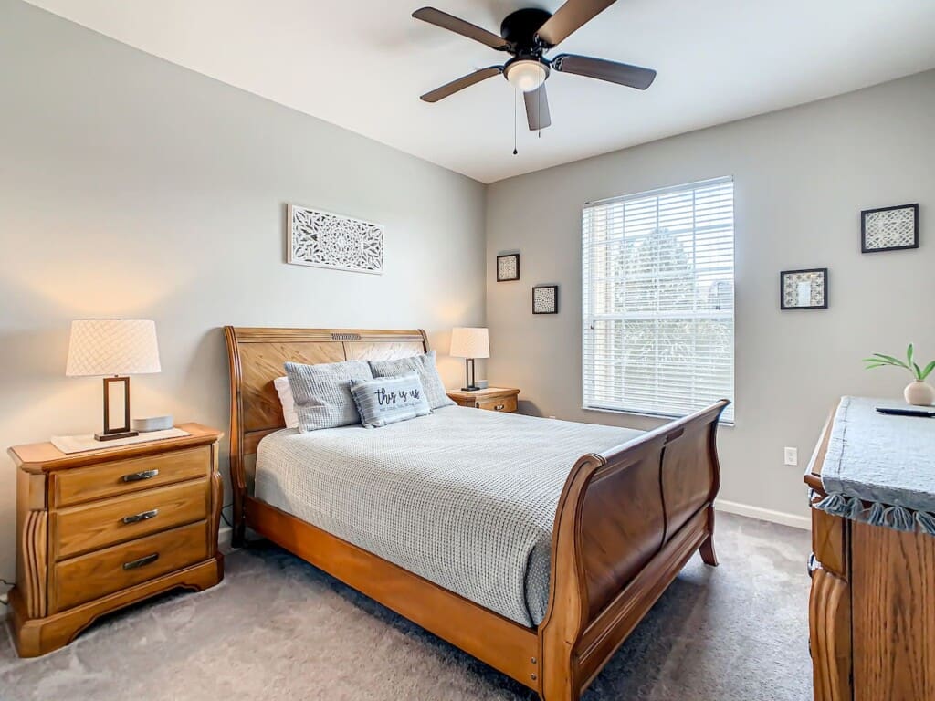A brightly lit modern bedroom in a Chillax Inn vacation home, ideal for families comparing the cost of renting a villa in Orlando vs hotel