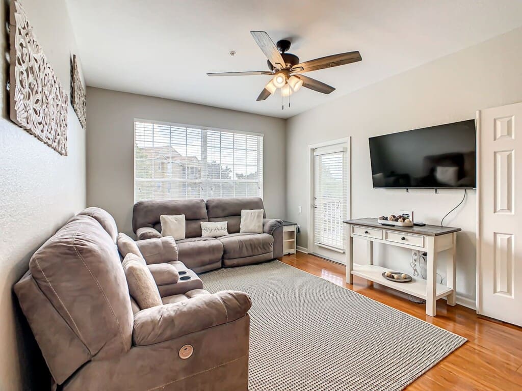 Spacious living room area inside a luxury yet affordable villa holidays in Florida rental.
