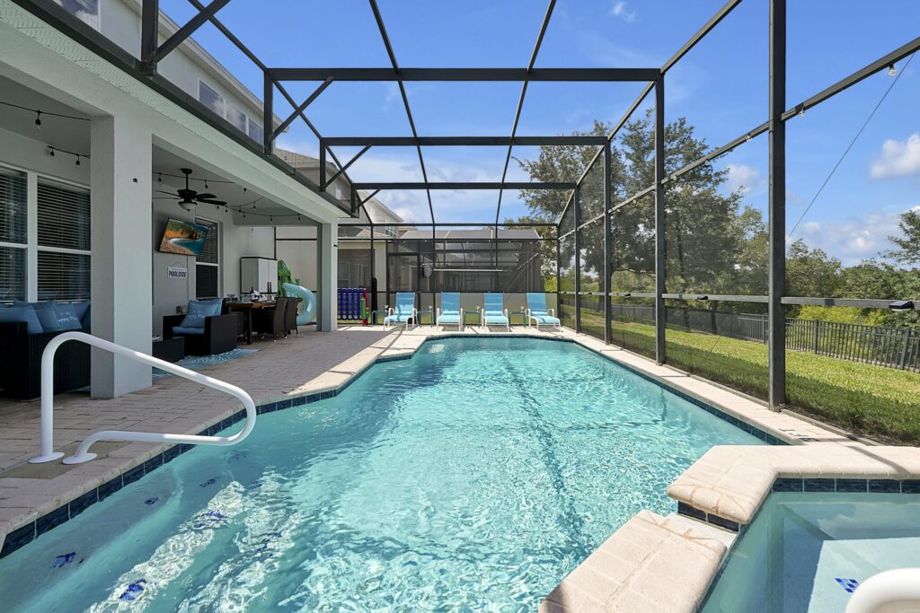 Sunny pool deck at Chillax Inn alongside tips on what to pack for an Orlando villa holiday